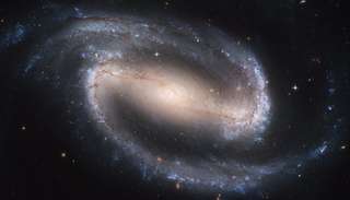 Une lointaine galaxie spirale barrée découverte par le James-Webb remet-elle en cause la cosmologie ?