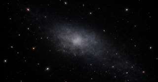 Hubble révèle une énigmatique galaxie composée presque uniquement de matière noire !