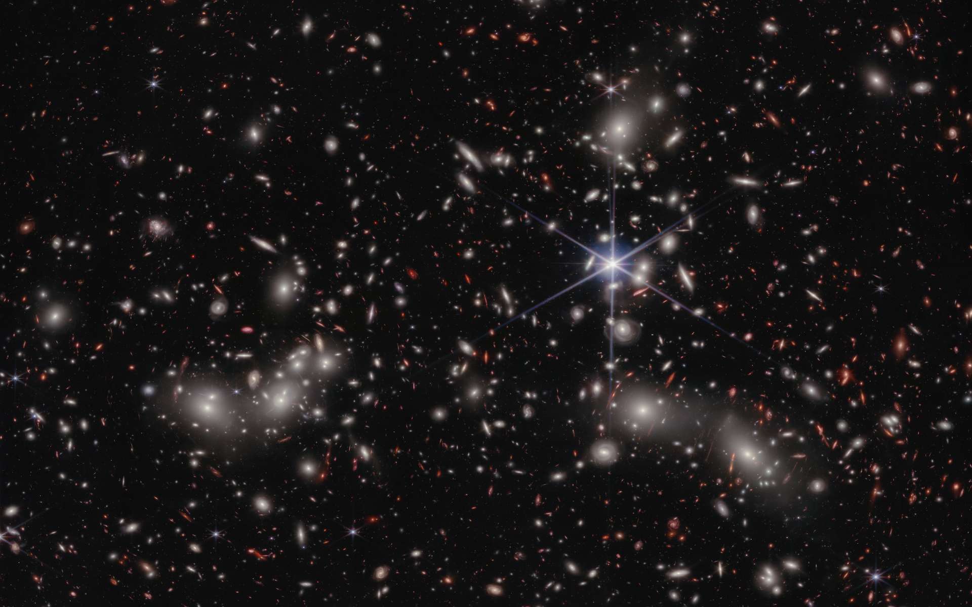 Un trou noir né avant sa galaxie ? Ce « petit point rouge » défie les astronomes