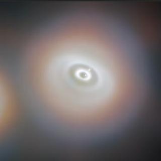 Impressão artística do jovem sistema planetário em torno da estrela Wispit 2. © ESO, C. Lawlor, RF van Capelleveen et al.