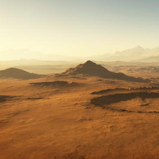 La surface de Mars au lever du Soleil.&nbsp;© Peter Jurik, Adobe Stock