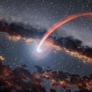 Cette illustration montre un flux lumineux de matière provenant d'une étoile en train d'être absorbée par un trou noir supermassif. Lorsqu'une étoile passe à une certaine distance d'un trou noir – suffisamment près pour être perturbée gravitationnellement –, la matière stellaire s'étire et se comprime en tombant dans le trou noir. © Nasa, JPL-Caltech