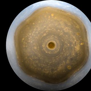 Pesquisadores da Universidade de Harvard (Estados Unidos) oferecem uma explicação para a tempestade em formato de hexágono no pólo norte de Saturno. © NASA, JPL-Caltech, SSI, Kevin M. Gill
