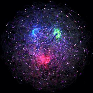 É difícil obter uma imagem da estrutura da matéria. Contudo, pesquisadores do Instituto de Tecnologia de Massachusetts (MIT, Estados Unidos) aceitaram o desafio. Eles fornecem uma animação que nos ajuda a visualizar a estrutura do próton. © Equipe “Visualizando o Próton”, MIT, Jefferson Lab