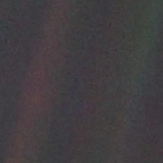 O pequeno ponto azul que podemos ver nesta imagem é a nossa Terra observada pela sonda Voyager-1 em 1990, a cerca de seis mil milhões de quilómetros de distância. © NASA, JPL-Caltech