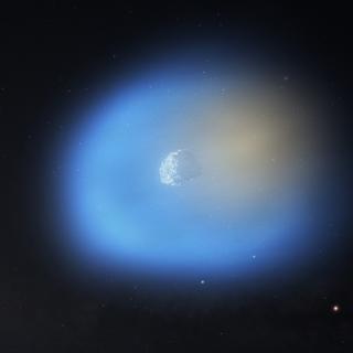 Esta ilustração do cometa 3I/Atlas mostra-o passando perto do Sol, iluminando uma das suas faces. No lado mais próximo do Sol, o metanol é mostrado em azul, com grãos de poeira gelada ainda presentes no gás. No lado escuro, o cianeto de hidrogênio é mostrado em laranja. © NSF, AUI, NSF NRAO, M. Weiss  