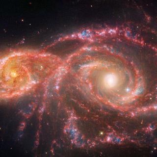 La palette macabre de ces galaxies est due à un mélange de lumière infrarouge moyenne provenant du télescope spatial James-Webb de la Nasa&nbsp;et de lumière visible et ultraviolette provenant du télescope spatial Hubble de la Nasa. Ces deux galaxies se sont effleurées il y a des millions d’années. La plus petite spirale à gauche, cataloguée comme IC 2163, est passée derrière NGC 2207, la plus grande galaxie spirale à droite. Les deux galaxies ont un taux de formation d’étoiles accru. Ensemble, on estime qu’elles forment l’équivalent de deux douzaines de nouvelles étoiles de la taille du Soleil chaque année. Notre Galaxie, la Voie lactée, forme l’équivalent de deux ou trois nouvelles étoiles semblables au Soleil par an. Les deux galaxies ont accueilli sept supernovae connues, chacune d’entre elles ayant peut-être libéré de l’espace dans leurs bras, réorganisant le gaz et la poussière qui se sont ensuite refroidis, et permis la formation de nombreuses nouvelles étoiles. (Trouvez ces zones en recherchant les régions les plus bleues.)&nbsp;© Nasa, ESA, CSA, STScI
