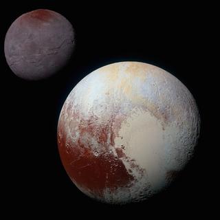 Vue globale de Pluton et Charon lors de la visite historique de la sonde New Horizons. © Nasa, SwRI, JHUAPL