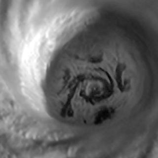 O olho do furacão Melissa e seus vórtices. © NASA