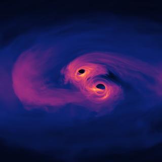 Un extrait d'une simulation d'un trou noir supermassif binaire avec ses disques d'accrétion. © Nasa’s Goddard Space Flight Center&nbsp;&nbsp;