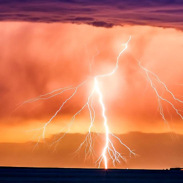 Couche de soleil orageux.&nbsp;© Bryce Bradford -&nbsp;CC BY-NC 2.0